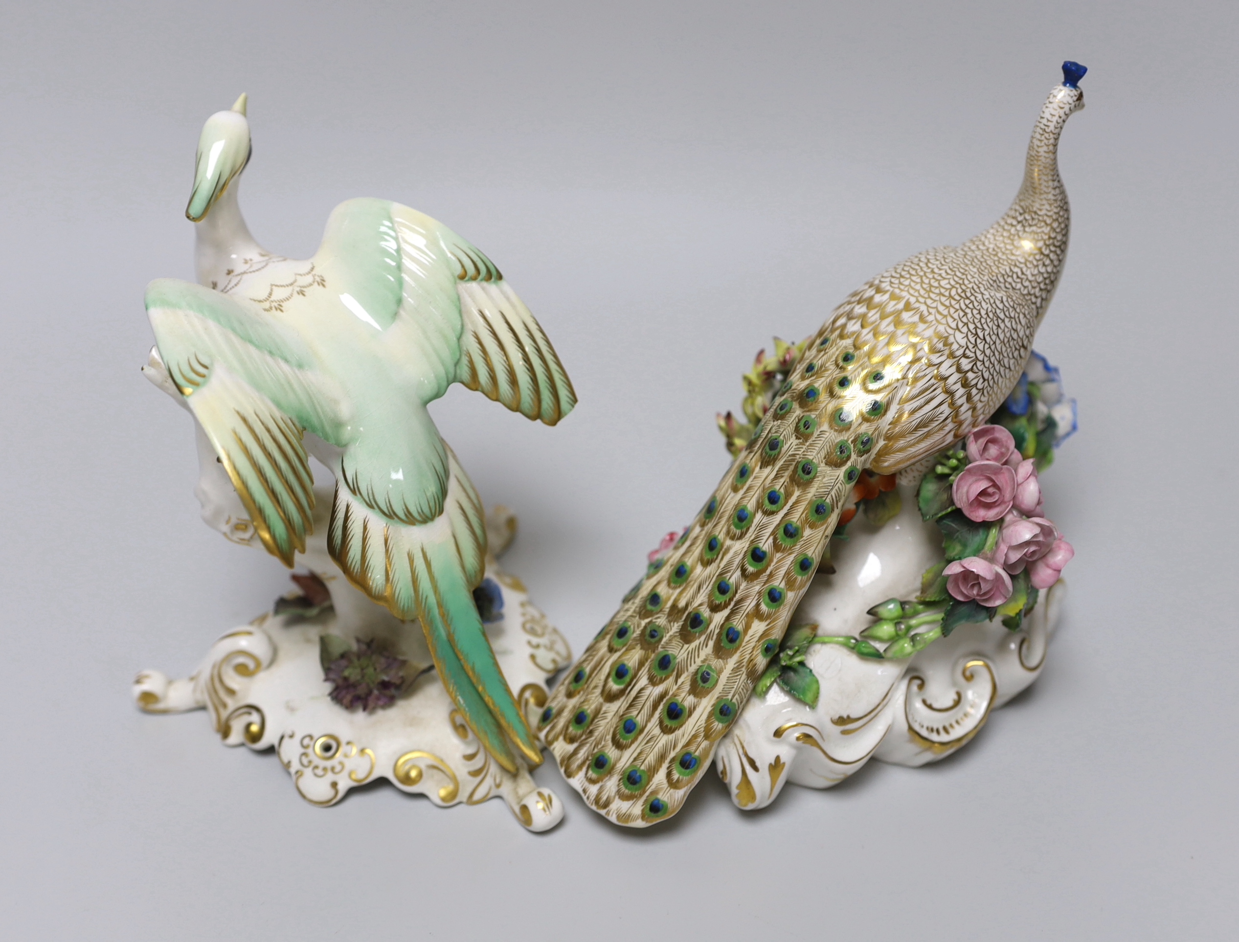 A King Street Derby peacock, 17cm, and a Royal Crown Derby bird